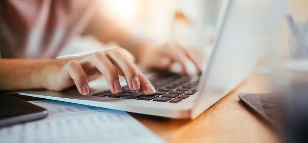 Person using laptop computer
