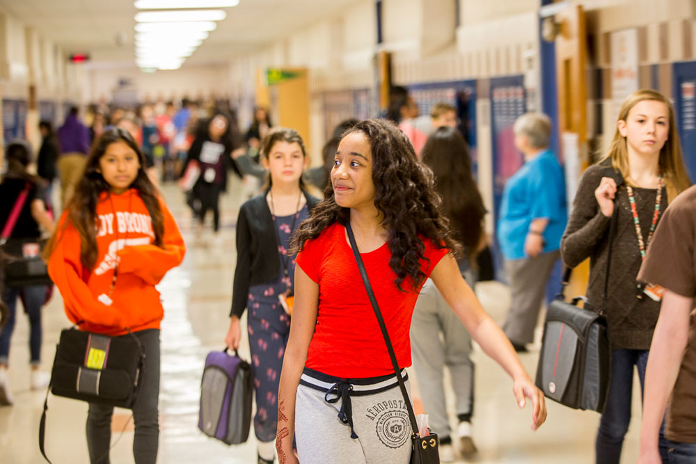 Students walking in the hallway at school