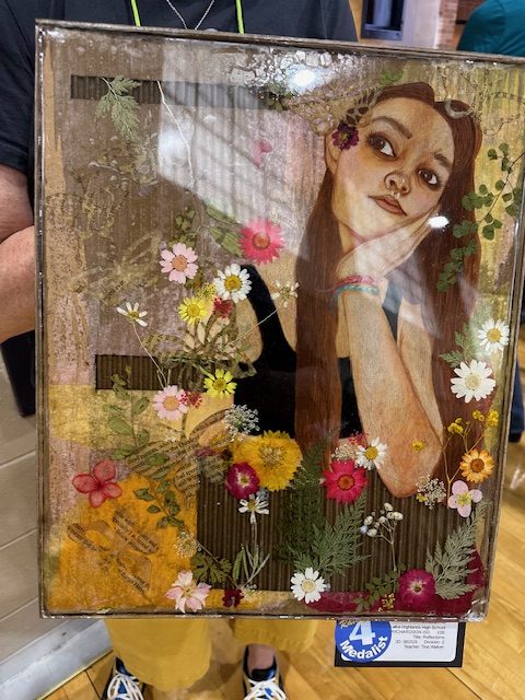 Student artwork of girl with flowers