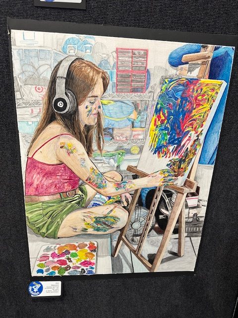 Student artwork of girl painting