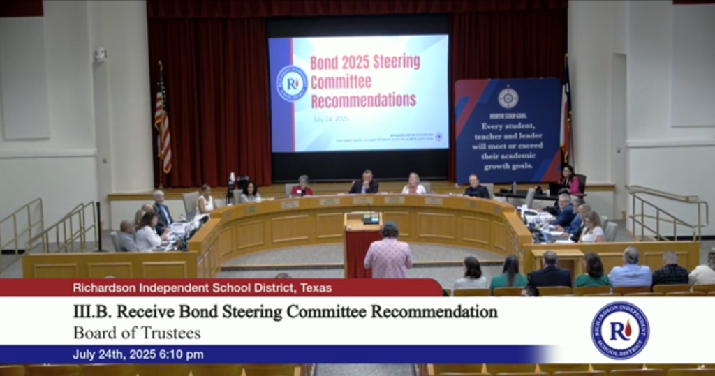 Clip from Board Meeting with presenter, board, superintendent and cabinet