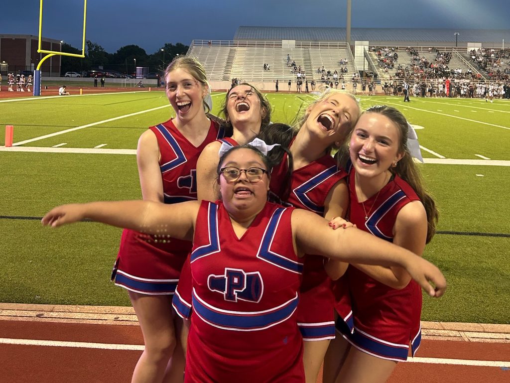 4 Students in JJ Pearce Spirit Stangs Squad at football game