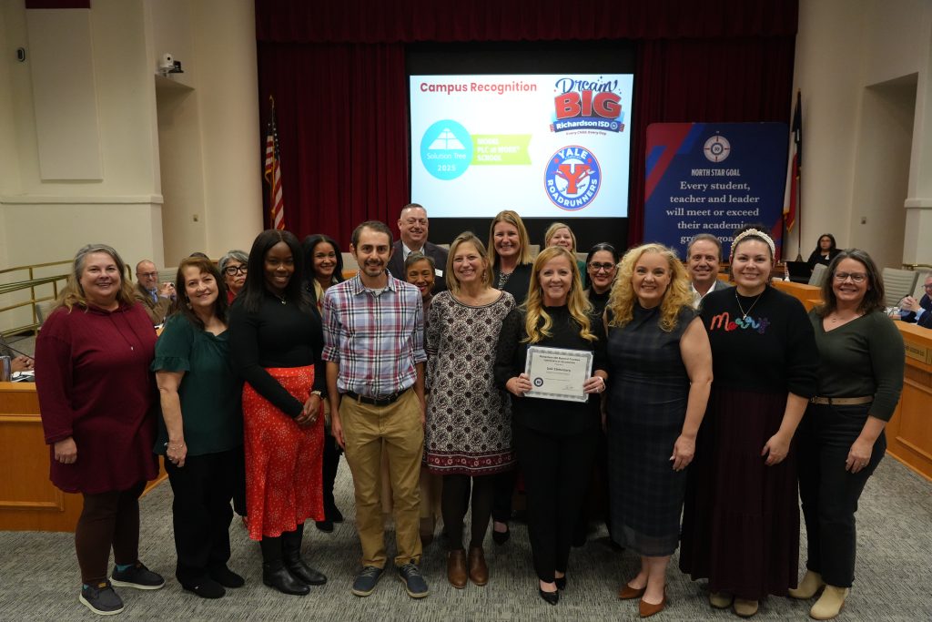 Yale Elementary Leadership team with Board of Trustees being recognized at a board meeting