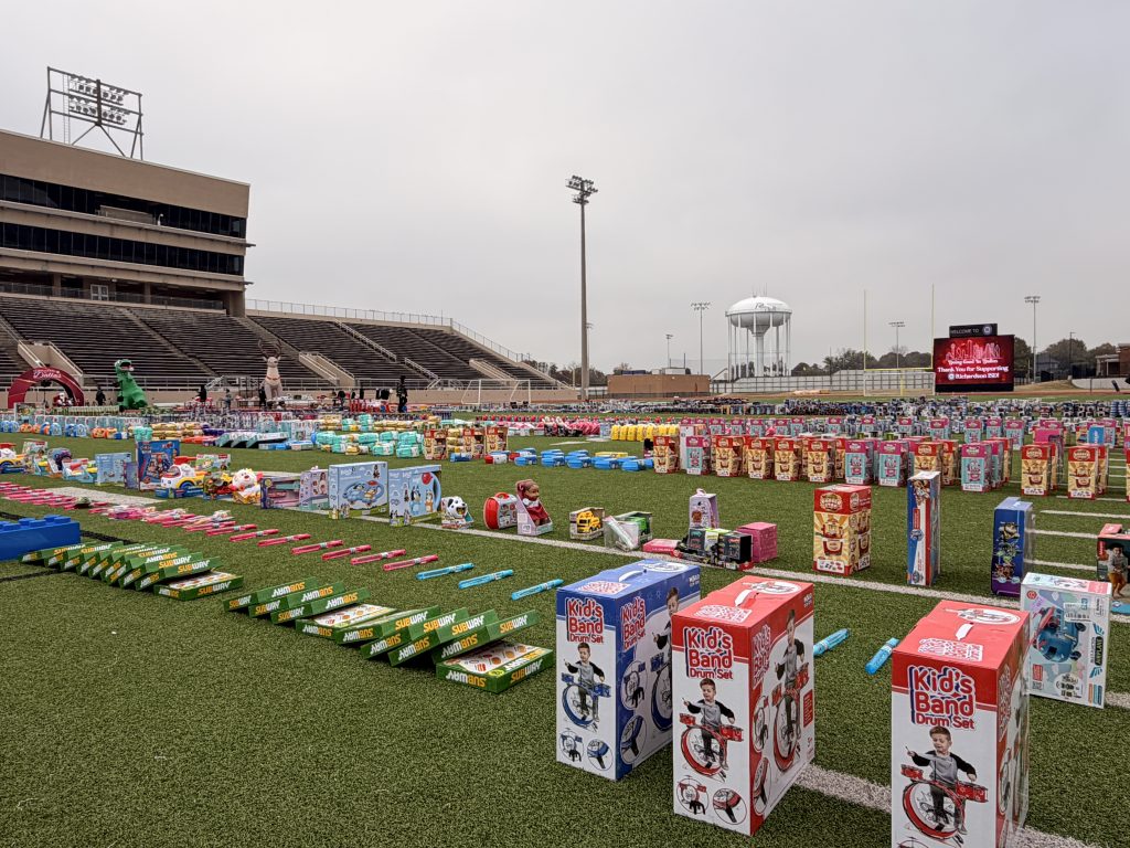 Toys lining the field at Eagle Mustang Stadium