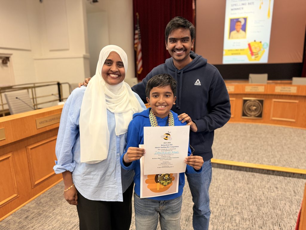 Zafar K., Winner from Richland Elementary with family