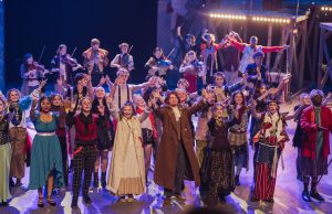 Cast of Great Comet in full costume on stage