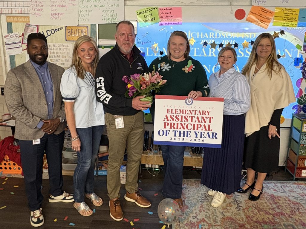 Catie Sheffield and team with Elementary AP of the year sig