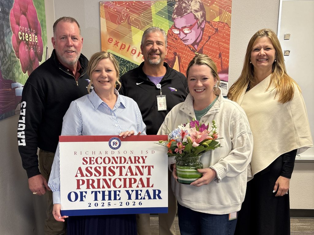 Alison Ream with AP of the Year sign