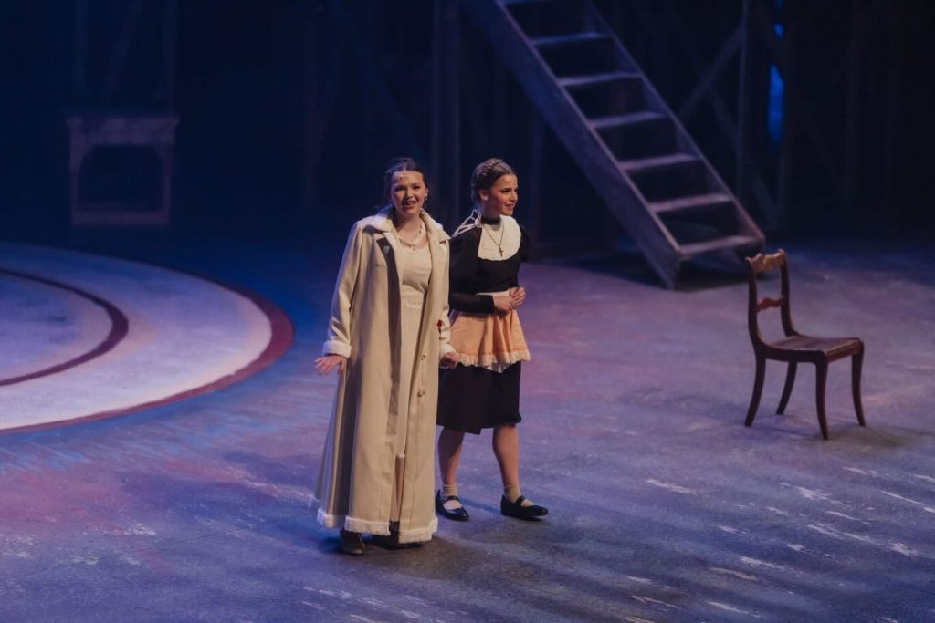 Mary supporting performer