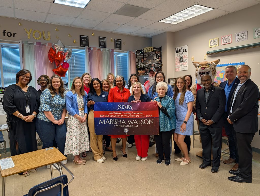 Marisha Watson - LHHS holding STARS teacher sign, big check, surrounded by prize patrol