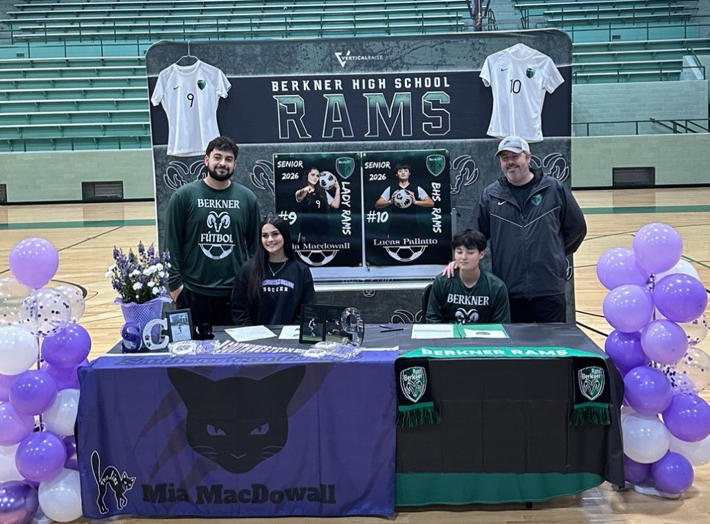 BHS students behind tables with campus branded items