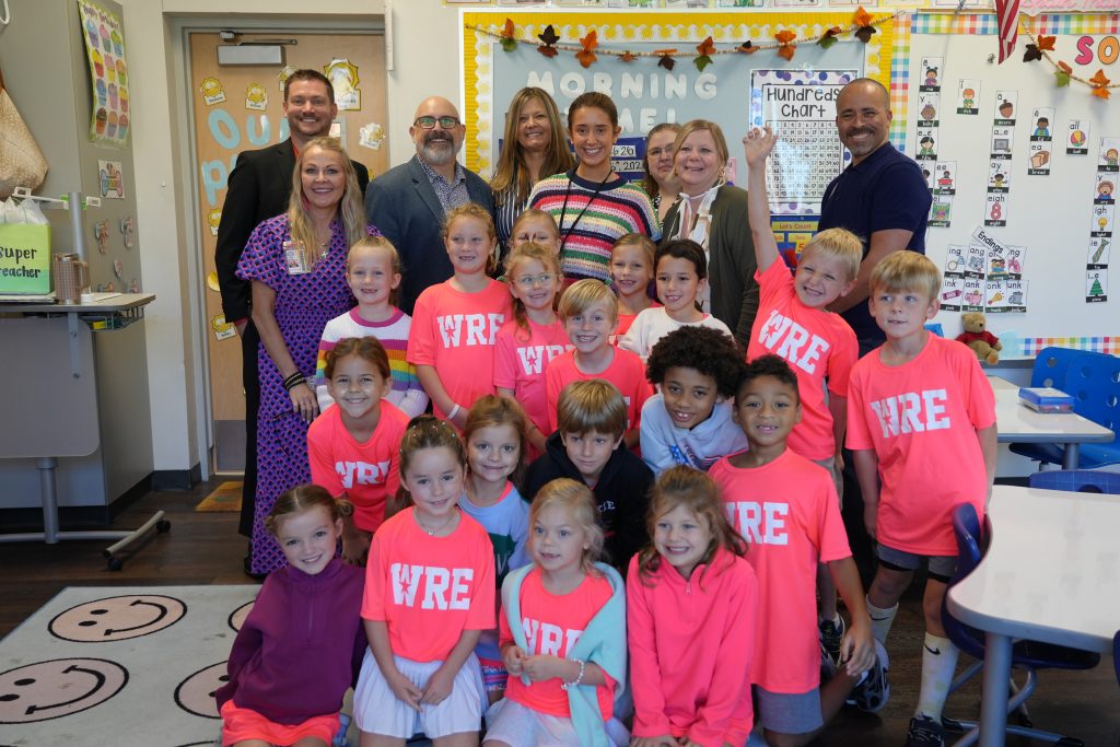 Eleanor Despain, White Rock Elementary with students and district admin