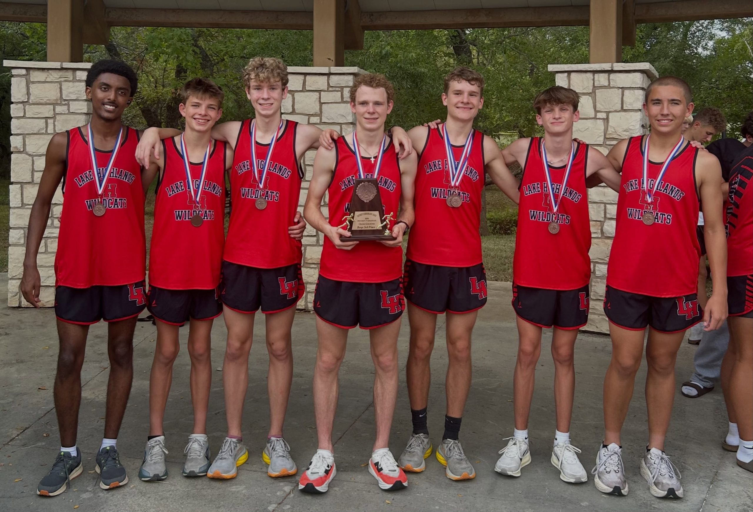 Lake Highlands High School Cross Country Team with Trophy