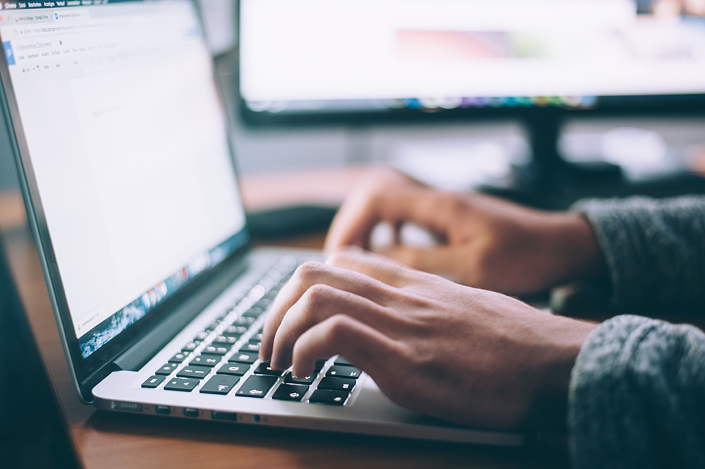 Person using laptop computer